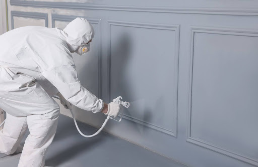 man in paint suit | exterior painting company