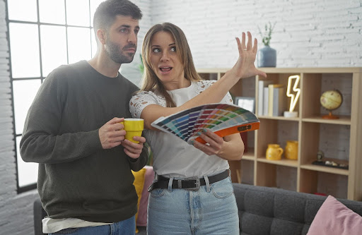 couple choosing color | home interior painting